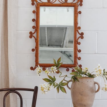 vintage french whimsical rattan mirror