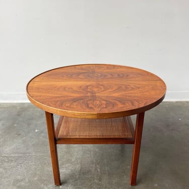 Vintage walnut with cane round end table by Jack Cartwright 