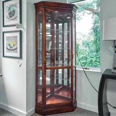 Howard Miller Lighted Cherry Corner Display Cabinet