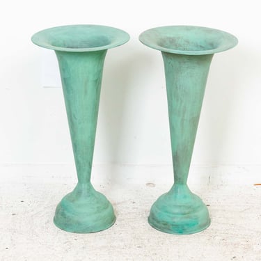 Pair of verdigris trumpet vases