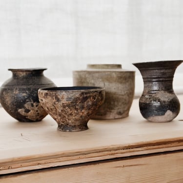 Antique chinese han era pottery vessels (202 bce - 220 ce) 