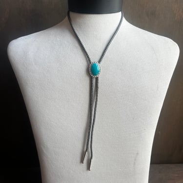 Faux Turquoise Bolo Tie on Black and White Cord