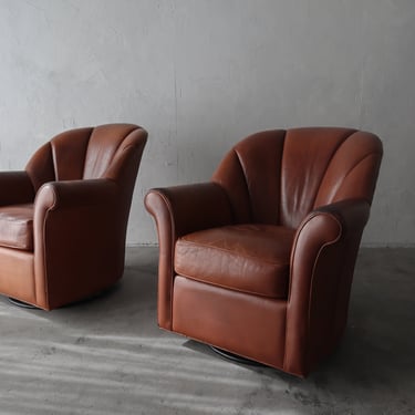 Pair of Patinaed Leather Rocking Swivel Lounge Chairs 