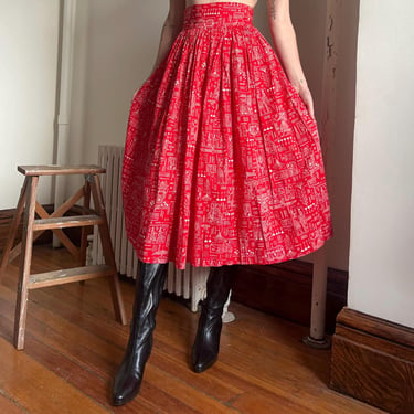 40’s vintage Egyptian revival pleated red skirt with white hieroglyphs print and celluloid buttons 