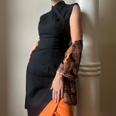 Late 40’s/early 50’s black wiggle dress with neon orange lining and slip 