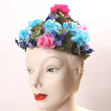 1950s 1960s Multi-Colored Bright Blue, Pink and Purple Floral Faux Flower Covered Formal Hat by Montaldo’s 