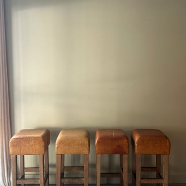 Leather bar stools. Sold as a set of 4.