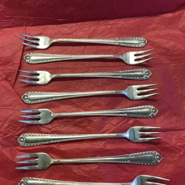 Set of 8 sterling silver fish or oyster forks by Meriden Britannia Aegean Weave 