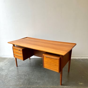 Vintage mid century Danish teak desk by Peter lovig - Please note that Shipping is not 1 dollar, Message us for a quote 