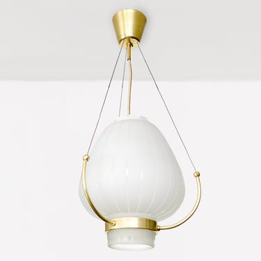 Orrefors pendant with polished and acid etched shade on brass frame.