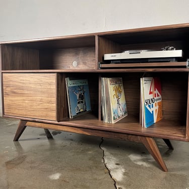 Mid century modern record player console. record storage The 