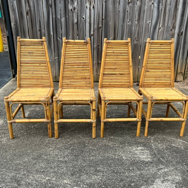 Fabulous set of four vintage slatted bamboo dining chairs. 