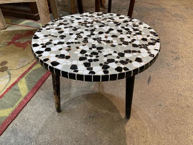 Super cute black and white rock shape mosaic top cocktail table. 20” x 17”