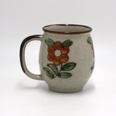 vintage speckled stoneware mug with orange flowers/made in  japan 