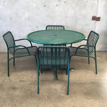 Green Metal Patio Set With Four Chairs