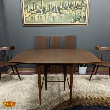 Mid-Century Modern drop-leaf dining table with 3 leaves from the Planner Group by Paul McCobb