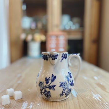 Beautiful rustic French farmhouse stoneware creamer in blue floral design 