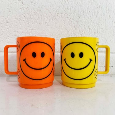 Vintage Deka Smiley Face Mug Coffee Cup Plastic Yellow Orange Black USA Retro Cute Kitsch Kawaii Stacking Pair Set of 2 1970s 