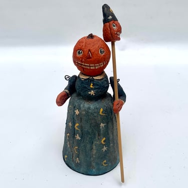 Pumpkin Head Woman with Spear Figurine