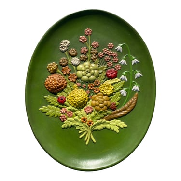 C. 1973 Mid Century Oval Ceramic Wall Hanging with Floral Motif 