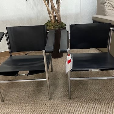 Lounge Chair (2)<br />Herman Miller<br />Black Leather (refurbished)<br />Silver Tone Metal Frame<br />L 24 x W 26 x H 23
