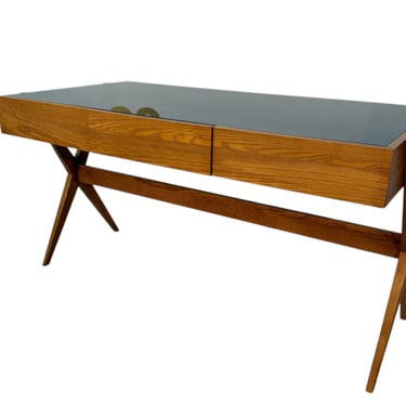 Italian desk with dark green glass top.