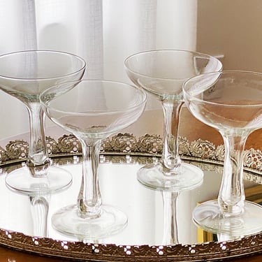 4 Hollow stem champagne glasses. Large vintage coupes in slightly mismatched sizes. Wedding toasting glasses 