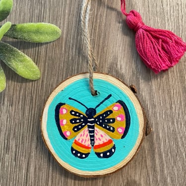 Folk Art Butterfly Ornament/ Blue, Pink and Gold Boho Christmas Decoration with Tassel/ Hand Painted Wood Slice Holiday Tree Decor 