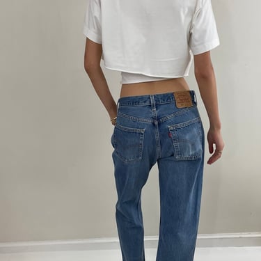 Vintage 80s Levi's 501 medium wash button fly iconic red tab faded Levis jeans made in USA size 30 x 30
