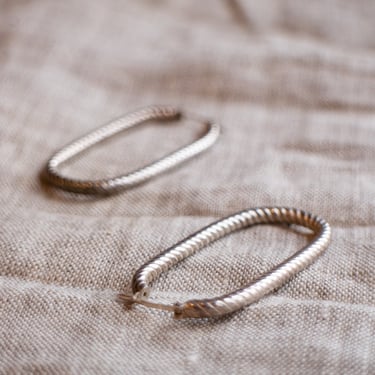 EH131 silver twisted oval hoops