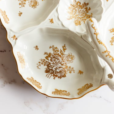 white and gold floral plate