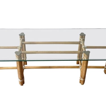 McGuire style bamboo coffee table with heavy glass top and brass accents 