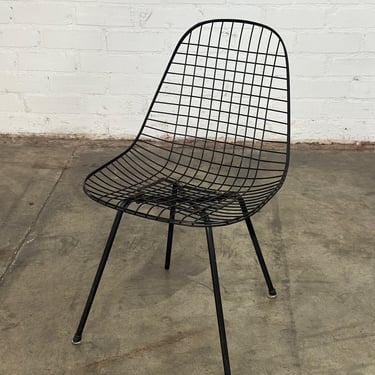 Early Eames low slung wire chair 
