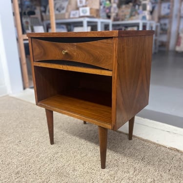 Free shipping within continental US - Mid-Century Modern Possibly Walnut Nightstand with Curved Drawer Front, Open Shelf, and Tapered Legs 