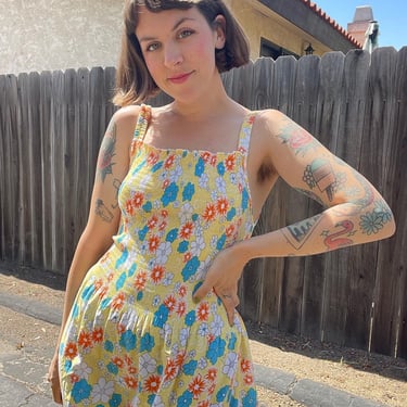 Vintage 90s does 70s yellow floral dress with smocked bust and tie at the waist 