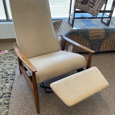 Recliner with Footrest<br />Milo Baughman for James, Inc.<br />Made in North Carolina<br />Circa 1950’s<br />Walnut Wood<br />Oatmeal Fabric<br />W 28.5 x D 28 x H 42.5