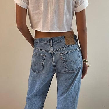 31 Levis 501 vintage jeans / vintage light wash faded soft boyfriend baggy high waisted relaxed fit button fly Levis 501 jeans made USA | 31 