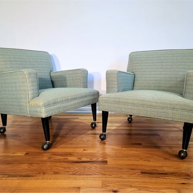 Mid Century Pair of Lounge Chairs with Casters 