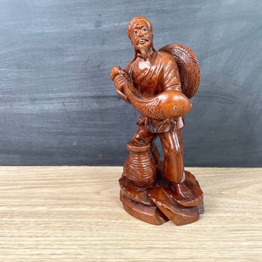 Carved wooden Asian fisherman with fish - vintage Asian decor 