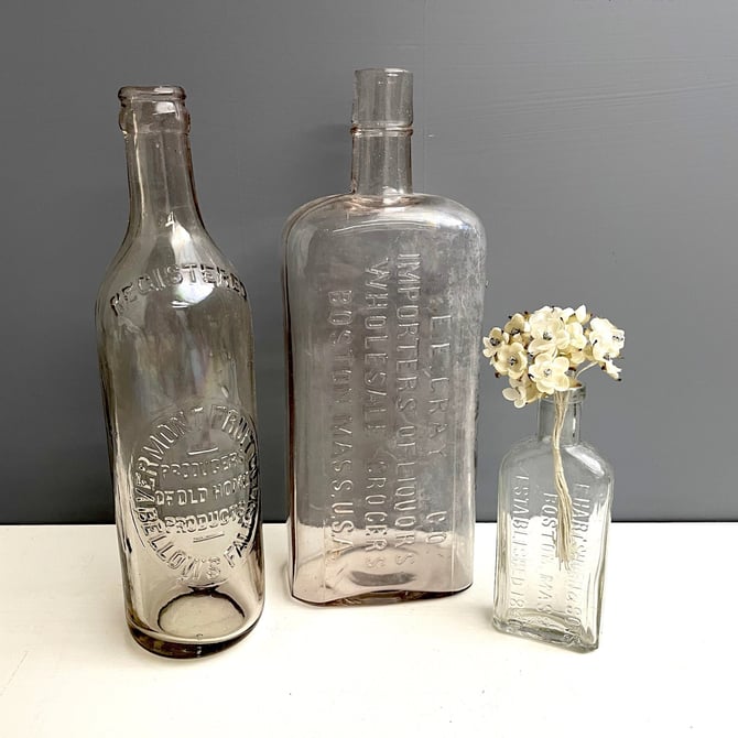 Antique New England bottles with embossed lettering - group of three - vintage glass bottles 