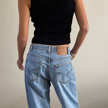 31 Levis 560 vintage jeans / vintage faded light wash worn in high waisted zipper fly boyfriend Levis 560 loose fit soft jeans USA | 31 