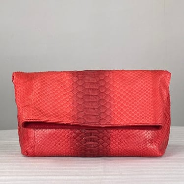 Coral python fold over clutch handbag from Laurent Effel St Barth