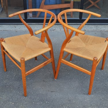 Two Hans Wegner Oak CH24 Wishbone Chairs w/ Woven Seats