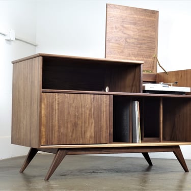 Mid century modern record player console. record storage The 