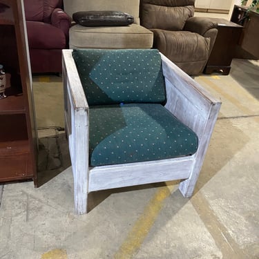 Rustic Wooden Armchair with Dark Green Patterned Cushions