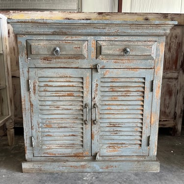 Gorgeous Distressed Shutter Cabinet