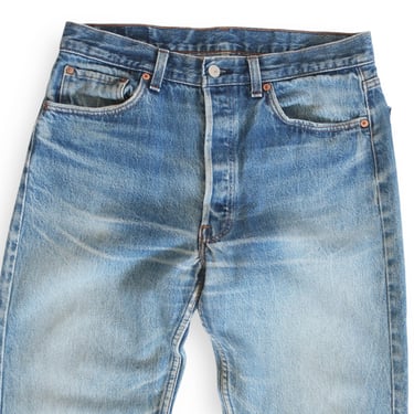 vintage levis 501 / 90s levis / 1990s Levis 501 distressed grunge high waist faded denim jeans 31 
