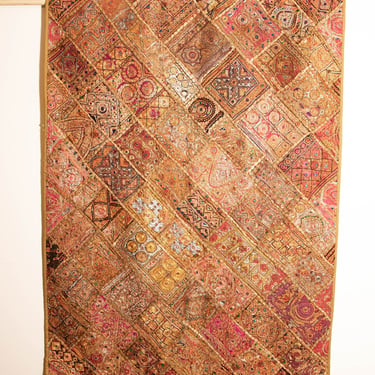India Wall Hanging with multi-color design: brown, reds, pinks, gold 