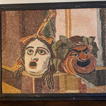 Roman mosaics depicting theatrical masks of tragedy and comedy. 