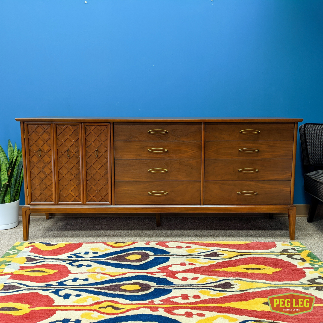 MidCentury Modern walnut 12drawer dresser with lattice accents Peg